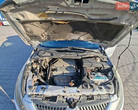 Серый Мицубиси Грандис, объемом двигателя 2.38 л и пробегом 215 тыс. км за 4619 $, фото 33 на Automoto.ua