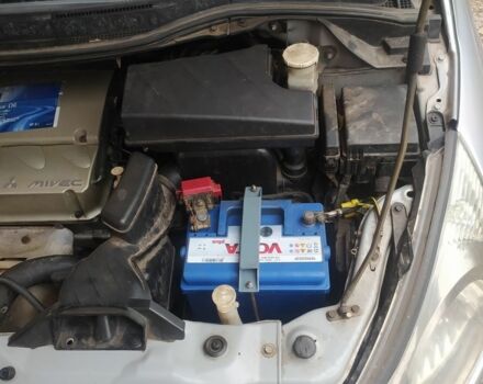 Серый Мицубиси Грандис, объемом двигателя 2.4 л и пробегом 260 тыс. км за 5700 $, фото 7 на Automoto.ua