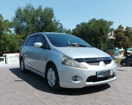 Серый Мицубиси Грандис, объемом двигателя 2.4 л и пробегом 245 тыс. км за 5100 $, фото 1 на Automoto.ua