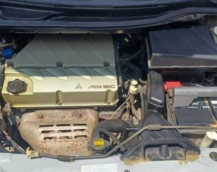 Серый Мицубиси Грандис, объемом двигателя 2.4 л и пробегом 312 тыс. км за 6800 $, фото 5 на Automoto.ua