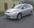 Серый Мицубиси Грандис, объемом двигателя 2.4 л и пробегом 280 тыс. км за 4300 $, фото 2 на Automoto.ua