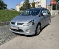Серый Мицубиси Грандис, объемом двигателя 2.38 л и пробегом 325 тыс. км за 5700 $, фото 1 на Automoto.ua