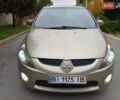 Сірий Міцубісі Грандіс, об'ємом двигуна 2.4 л та пробігом 246 тис. км за 6200 $, фото 1 на Automoto.ua
