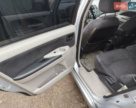 Сірий Міцубісі Грандіс, об'ємом двигуна 2.4 л та пробігом 375 тис. км за 3299 $, фото 5 на Automoto.ua