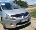 Серый Мицубиси Грандис, объемом двигателя 2.4 л и пробегом 312 тыс. км за 6800 $, фото 2 на Automoto.ua