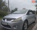 Серый Мицубиси Грандис, объемом двигателя 2.4 л и пробегом 222 тыс. км за 6700 $, фото 1 на Automoto.ua