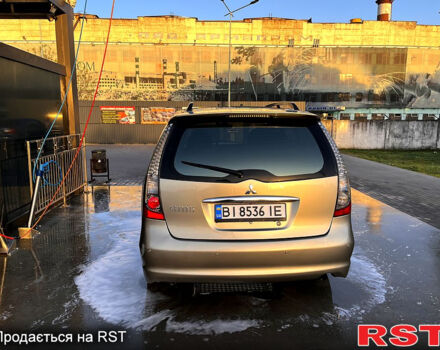 Серый Мицубиси Грандис, объемом двигателя 2.4 л и пробегом 277 тыс. км за 6000 $, фото 3 на Automoto.ua