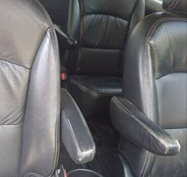 Серый Мицубиси Грандис, объемом двигателя 2.4 л и пробегом 312 тыс. км за 6800 $, фото 1 на Automoto.ua