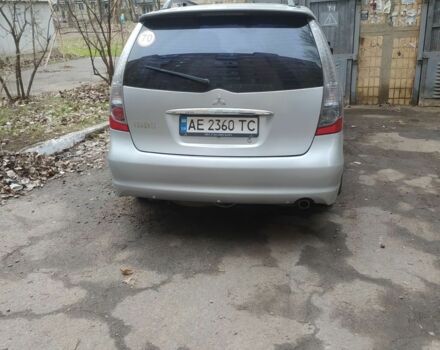 Серый Мицубиси Грандис, объемом двигателя 2.4 л и пробегом 260 тыс. км за 5700 $, фото 1 на Automoto.ua