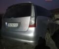 Серый Мицубиси Грандис, объемом двигателя 2.4 л и пробегом 261 тыс. км за 5490 $, фото 1 на Automoto.ua