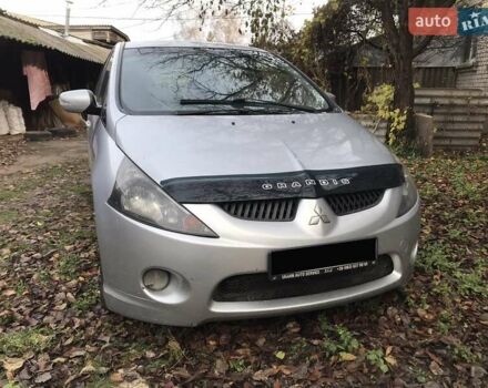Серый Мицубиси Грандис, объемом двигателя 2.4 л и пробегом 250 тыс. км за 5999 $, фото 1 на Automoto.ua
