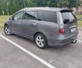 Серый Мицубиси Грандис, объемом двигателя 2.38 л и пробегом 316 тыс. км за 5750 $, фото 1 на Automoto.ua