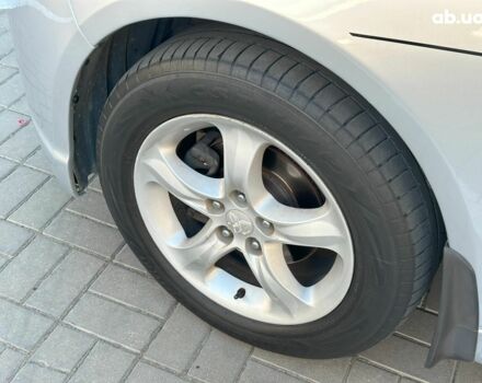 Серый Мицубиси Грандис, объемом двигателя 2.4 л и пробегом 201 тыс. км за 6990 $, фото 7 на Automoto.ua