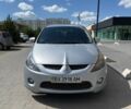 Сірий Міцубісі Грандіс, об'ємом двигуна 2.4 л та пробігом 290 тис. км за 4999 $, фото 1 на Automoto.ua