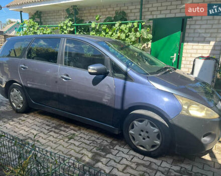 Серый Мицубиси Грандис, объемом двигателя 2.38 л и пробегом 271 тыс. км за 5400 $, фото 2 на Automoto.ua