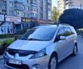 Серый Мицубиси Грандис, объемом двигателя 2.4 л и пробегом 300 тыс. км за 6700 $, фото 1 на Automoto.ua