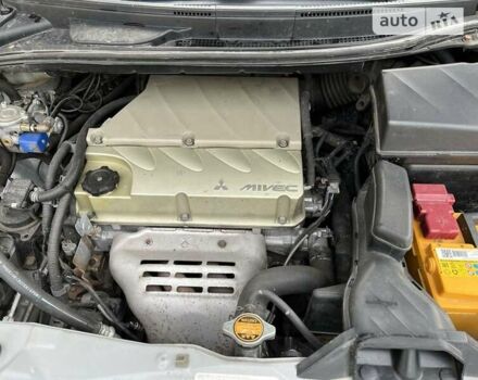 Сірий Міцубісі Грандіс, об'ємом двигуна 2.4 л та пробігом 193 тис. км за 5950 $, фото 22 на Automoto.ua
