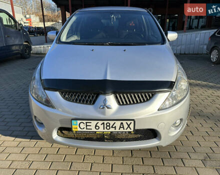 Серый Мицубиси Грандис, объемом двигателя 2.4 л и пробегом 276 тыс. км за 6800 $, фото 1 на Automoto.ua