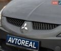 Серый Мицубиси Грандис, объемом двигателя 2.38 л и пробегом 220 тыс. км за 5700 $, фото 7 на Automoto.ua