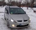 Серый Мицубиси Грандис, объемом двигателя 2.4 л и пробегом 195 тыс. км за 6900 $, фото 1 на Automoto.ua