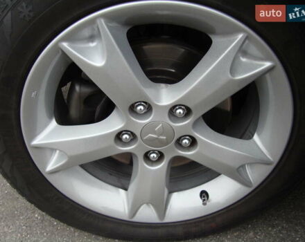 Серый Мицубиси Грандис, объемом двигателя 2.38 л и пробегом 258 тыс. км за 7999 $, фото 33 на Automoto.ua