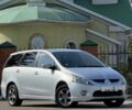 Серый Мицубиси Грандис, объемом двигателя 2.4 л и пробегом 185 тыс. км за 5961 $, фото 1 на Automoto.ua