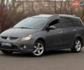 Серый Мицубиси Грандис, объемом двигателя 2.38 л и пробегом 220 тыс. км за 5700 $, фото 1 на Automoto.ua
