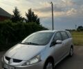 Серый Мицубиси Грандис, объемом двигателя 2.4 л и пробегом 322 тыс. км за 3999 $, фото 1 на Automoto.ua