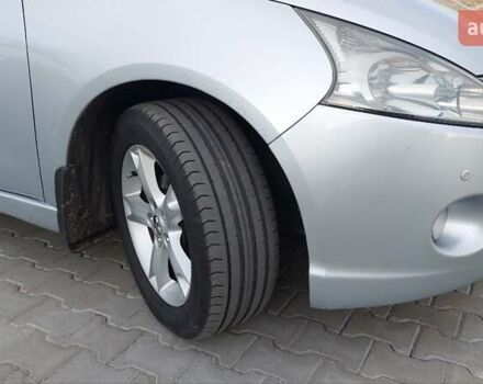 Сірий Міцубісі Грандіс, об'ємом двигуна 2.38 л та пробігом 296 тис. км за 7000 $, фото 2 на Automoto.ua