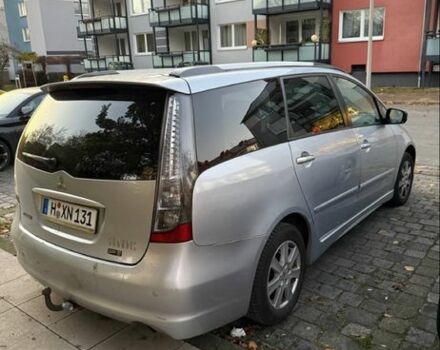 Серый Мицубиси Грандис, объемом двигателя 2 л и пробегом 300 тыс. км за 3499 $, фото 3 на Automoto.ua