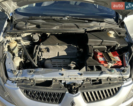 Серый Мицубиси Грандис, объемом двигателя 2.4 л и пробегом 276 тыс. км за 6800 $, фото 42 на Automoto.ua