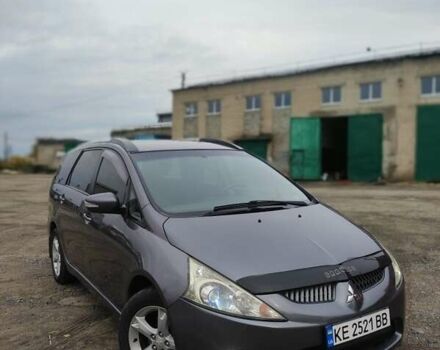 Серый Мицубиси Грандис, объемом двигателя 2.4 л и пробегом 180 тыс. км за 7500 $, фото 2 на Automoto.ua