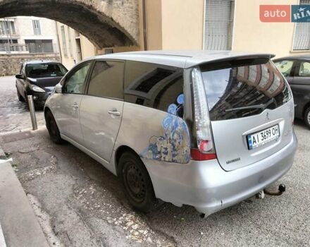 Серый Мицубиси Грандис, объемом двигателя 2.4 л и пробегом 480 тыс. км за 5800 $, фото 3 на Automoto.ua