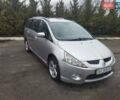 Серый Мицубиси Грандис, объемом двигателя 2.4 л и пробегом 153 тыс. км за 6900 $, фото 1 на Automoto.ua