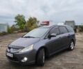 Серый Мицубиси Грандис, объемом двигателя 2.4 л и пробегом 180 тыс. км за 7500 $, фото 1 на Automoto.ua