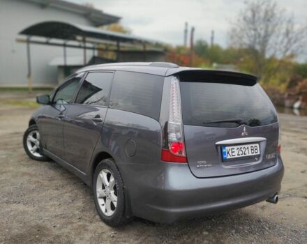 Серый Мицубиси Грандис, объемом двигателя 2.4 л и пробегом 180 тыс. км за 7500 $, фото 2 на Automoto.ua