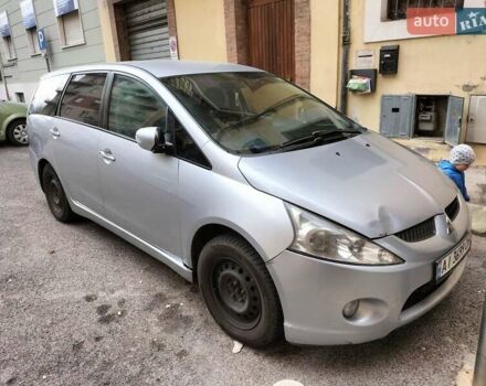 Серый Мицубиси Грандис, объемом двигателя 2.4 л и пробегом 480 тыс. км за 5800 $, фото 1 на Automoto.ua