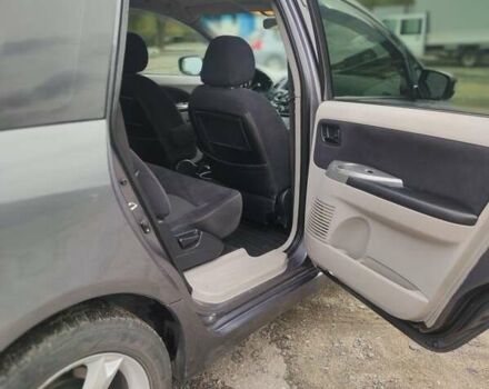 Серый Мицубиси Грандис, объемом двигателя 2.4 л и пробегом 180 тыс. км за 7500 $, фото 5 на Automoto.ua