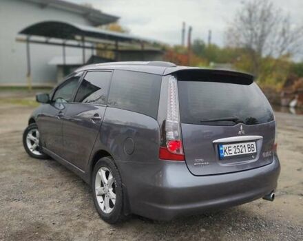 Серый Мицубиси Грандис, объемом двигателя 2.4 л и пробегом 180 тыс. км за 7500 $, фото 1 на Automoto.ua