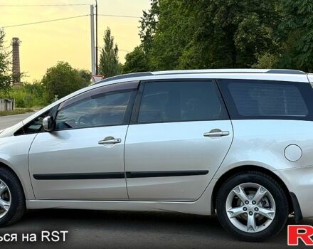 Серый Мицубиси Грандис, объемом двигателя 2.4 л и пробегом 93 тыс. км за 8800 $, фото 2 на Automoto.ua