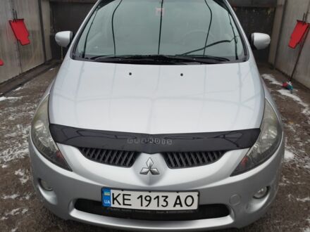 Серый Мицубиси Грандис, объемом двигателя 2.4 л и пробегом 288 тыс. км за 6000 $, фото 1 на Automoto.ua