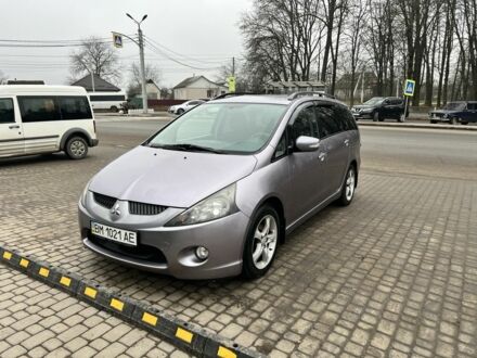 Серый Мицубиси Грандис, объемом двигателя 2.4 л и пробегом 210 тыс. км за 6800 $, фото 1 на Automoto.ua