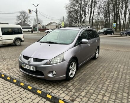 Серый Мицубиси Грандис, объемом двигателя 2.4 л и пробегом 210 тыс. км за 6800 $, фото 1 на Automoto.ua