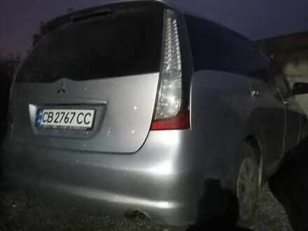 Серый Мицубиси Грандис, объемом двигателя 2.4 л и пробегом 261 тыс. км за 5490 $, фото 1 на Automoto.ua