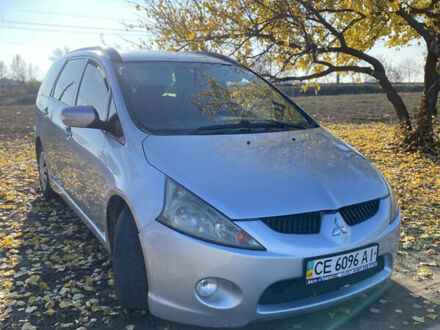 Серый Мицубиси Грандис, объемом двигателя 2.4 л и пробегом 293 тыс. км за 5200 $, фото 1 на Automoto.ua