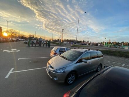 Серый Мицубиси Грандис, объемом двигателя 2.4 л и пробегом 309 тыс. км за 6000 $, фото 1 на Automoto.ua