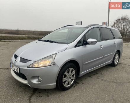 Серый Мицубиси Грандис, объемом двигателя 2 л и пробегом 320 тыс. км за 3599 $, фото 1 на Automoto.ua