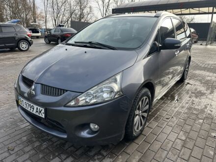 Серый Мицубиси Грандис, объемом двигателя 2.4 л и пробегом 191 тыс. км за 6865 $, фото 1 на Automoto.ua