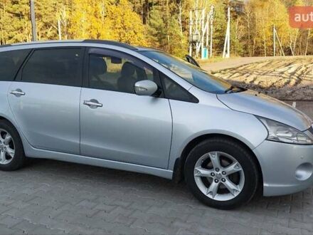 Серый Мицубиси Грандис, объемом двигателя 2.38 л и пробегом 296 тыс. км за 7000 $, фото 1 на Automoto.ua