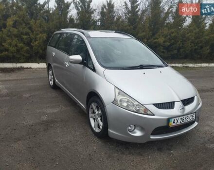 Серый Мицубиси Грандис, объемом двигателя 2.4 л и пробегом 153 тыс. км за 6900 $, фото 1 на Automoto.ua